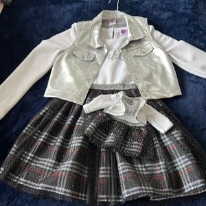 Girl’s Dollie and me dresses.